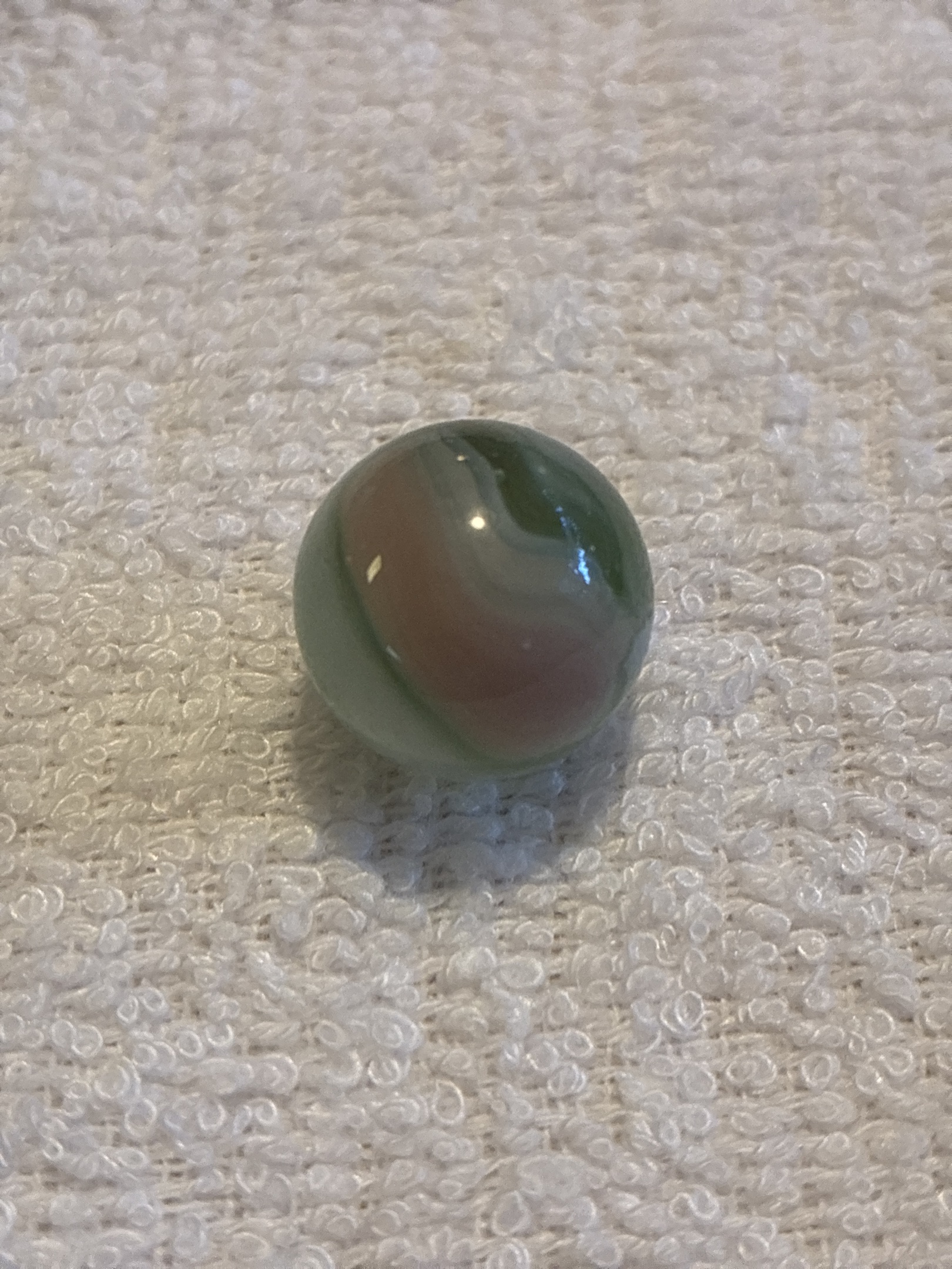 Green Swirl with Oxblood/Red-Brown by Akro Agate Company, identification view