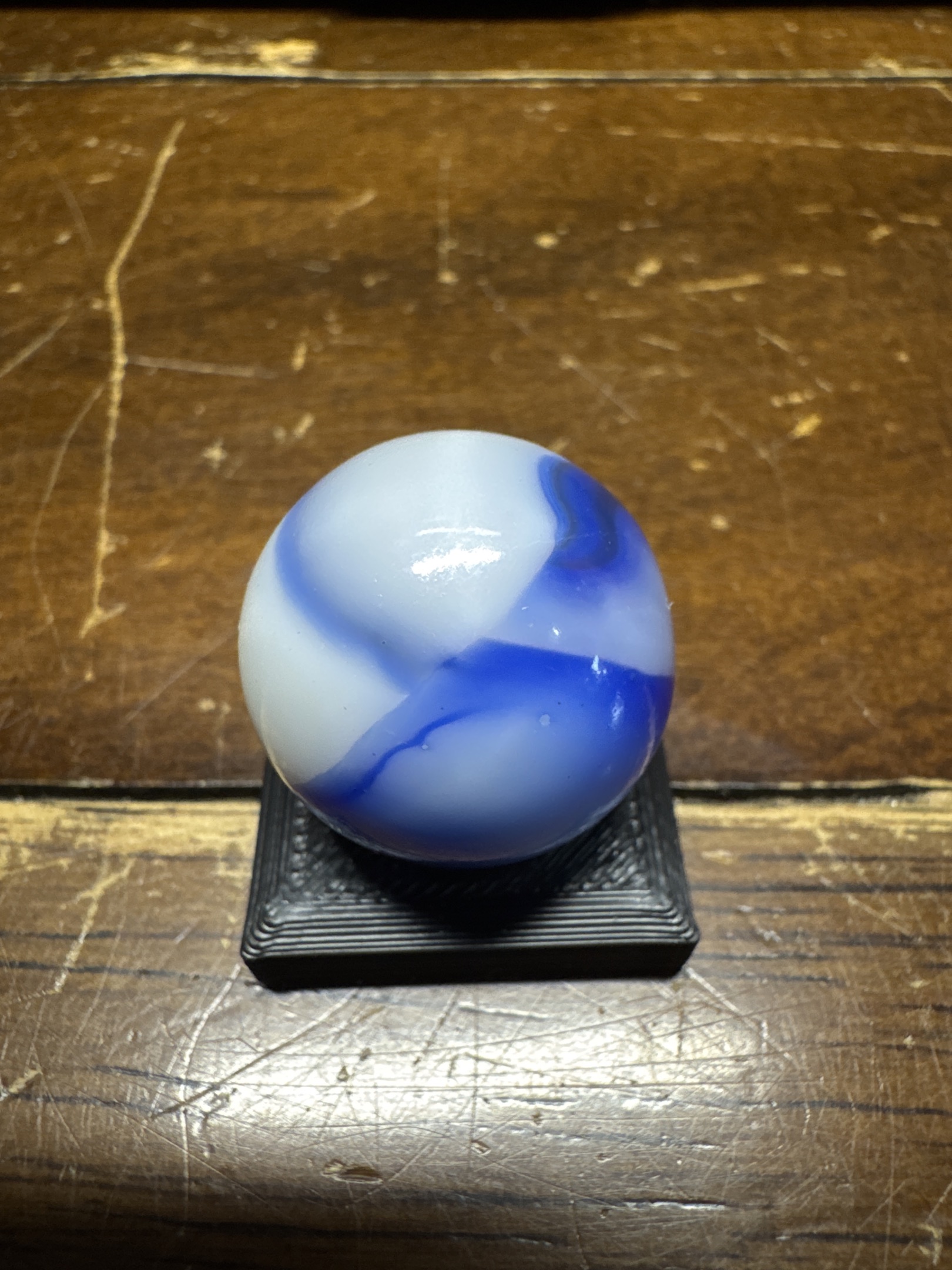 Blue and White Prize Name Shooter by Akro Agate Company