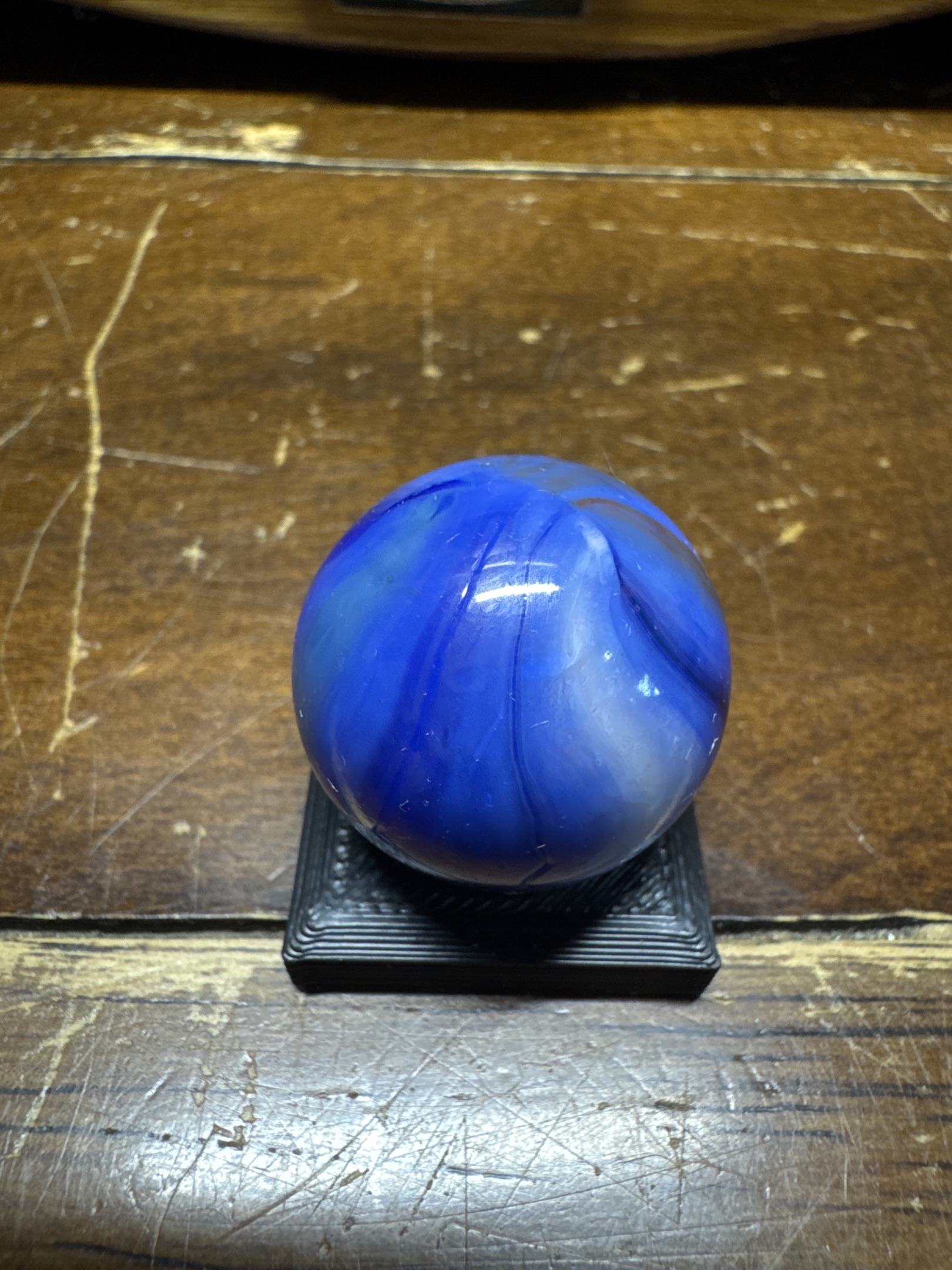 Blue Oxblood Swirl (Shooter) by Akro Agate Company