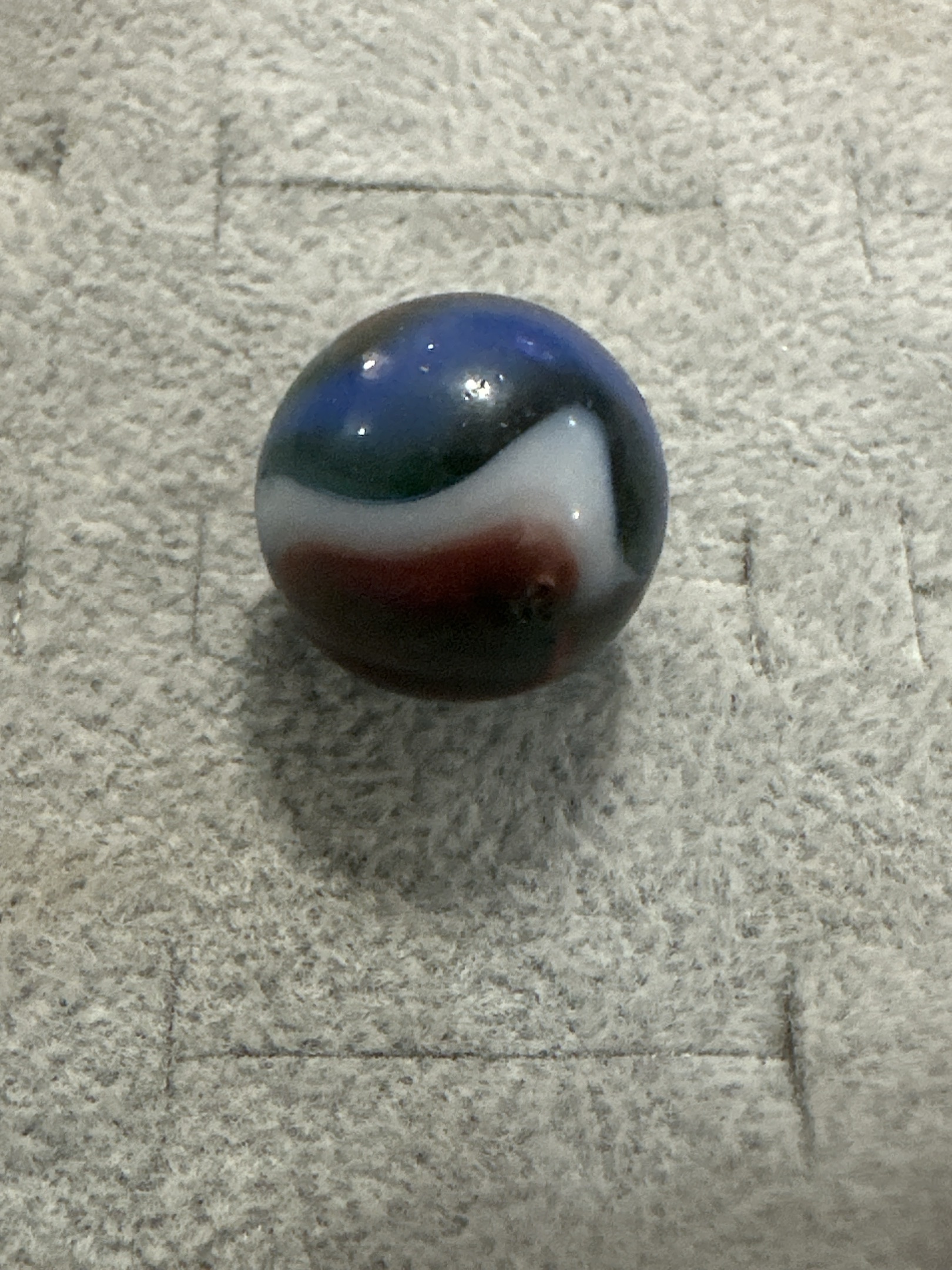 Multi-Color Swirl (Red, Blue, White on Dark) by Peltier Glass Co., identification view