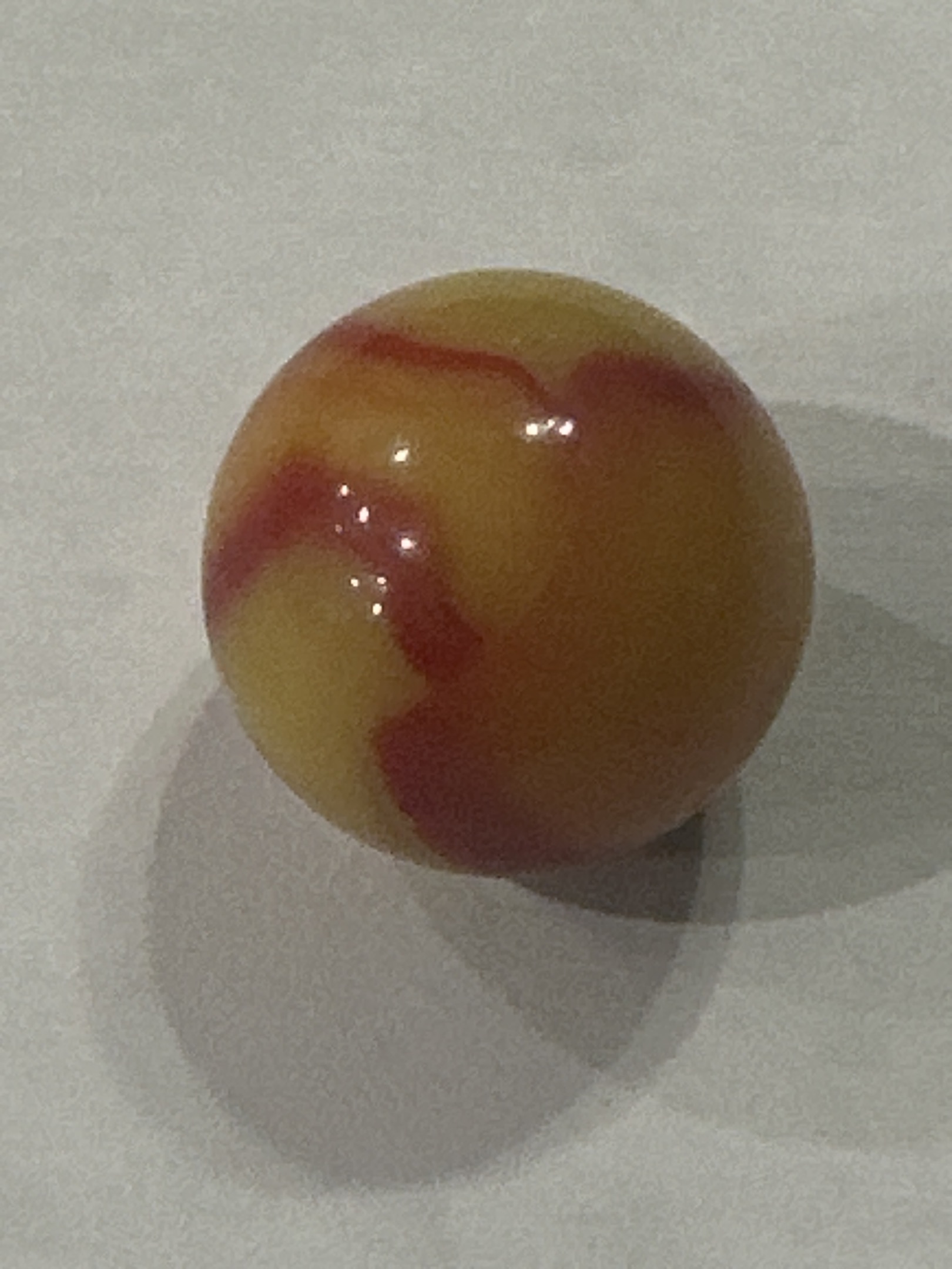 Yellow and Red Swirl by Vitro Agate Company, identification view