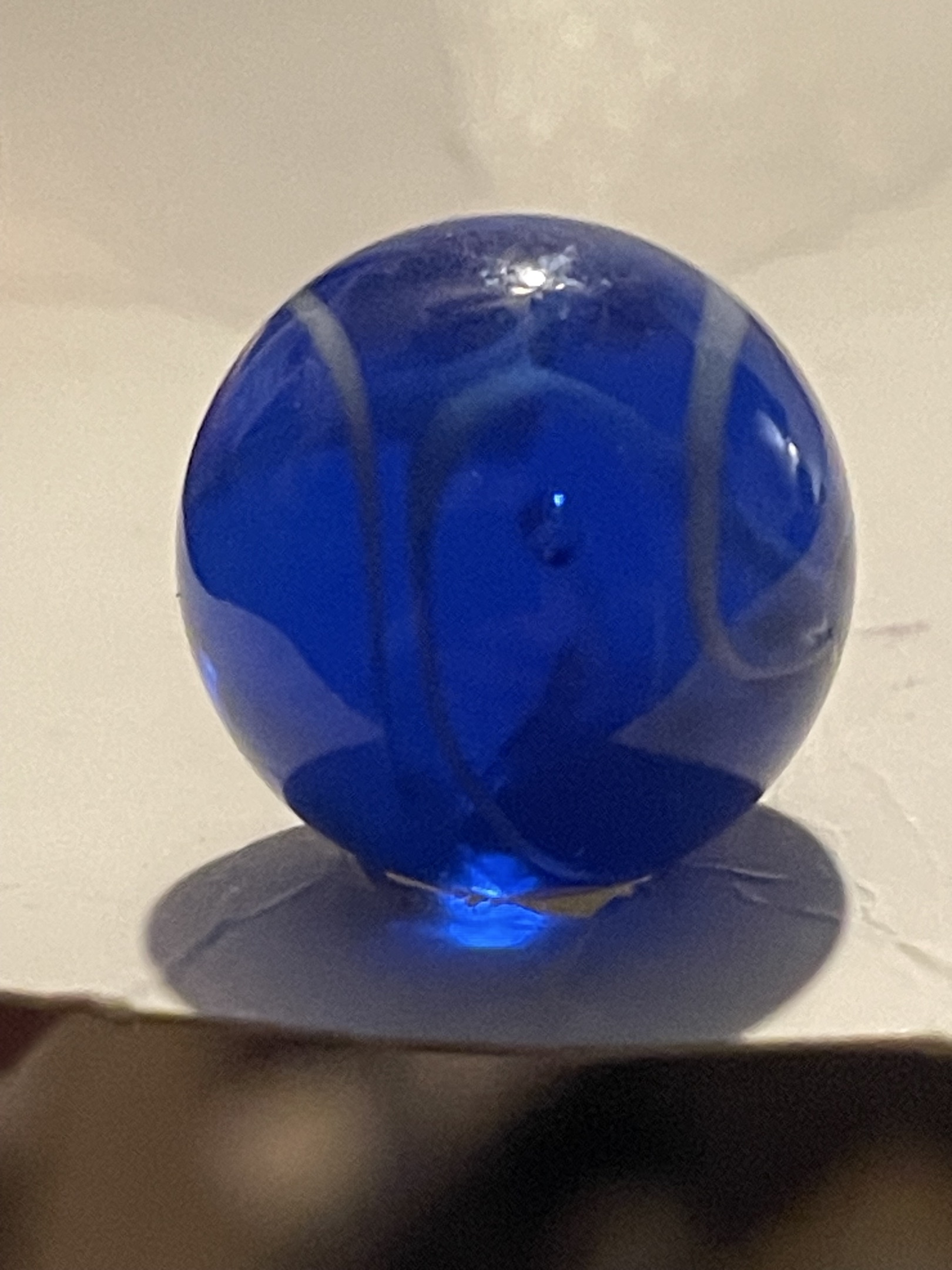 White Vanes in Cobalt Blue by Marble King, identification view