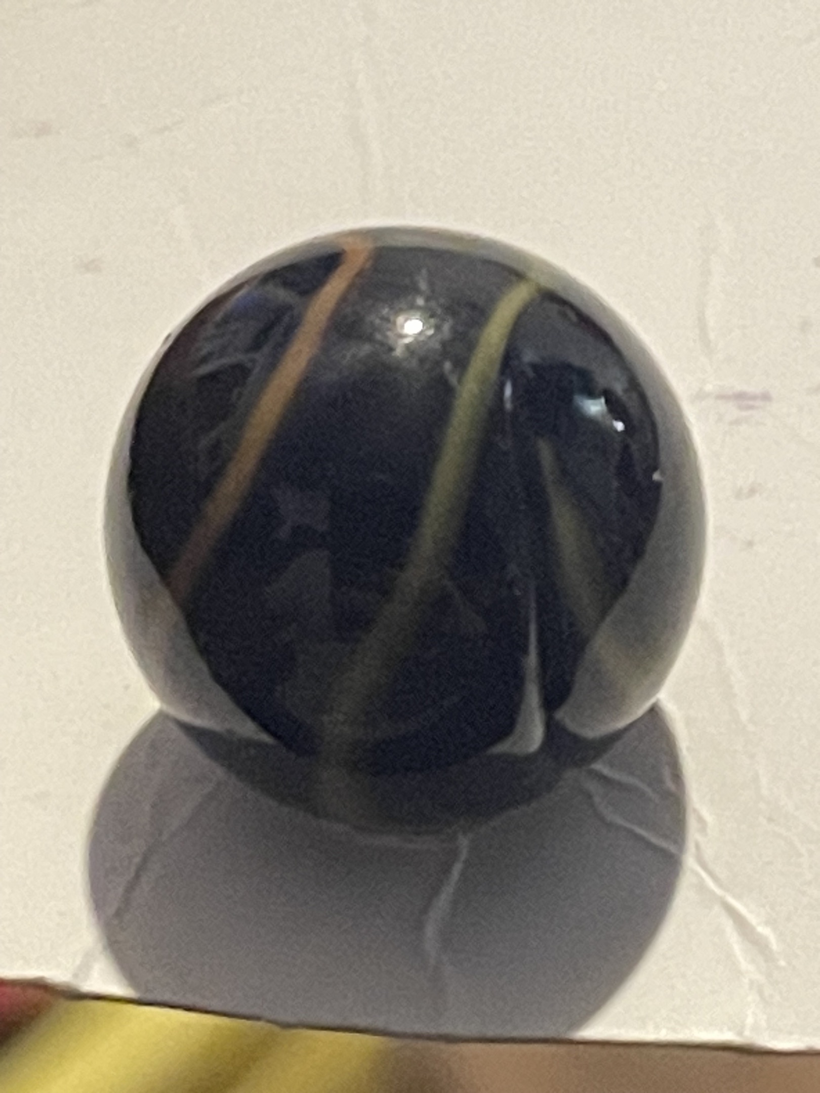 Black Base with Green and Orange Swirls by Ravenswood Novelty Works, identification view