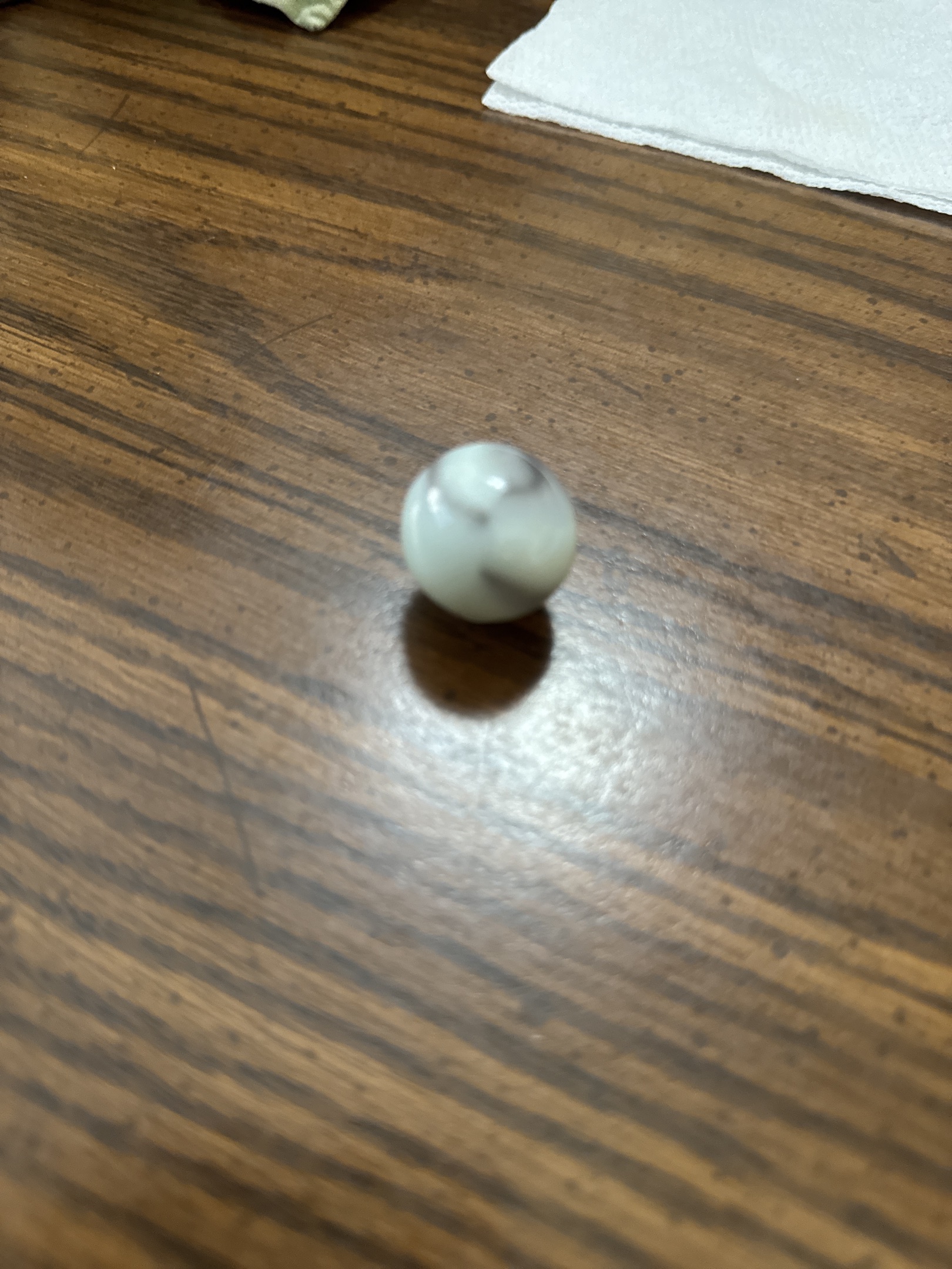 Chocolate on White Swirl Shooter by Alley Agate Company, identification view