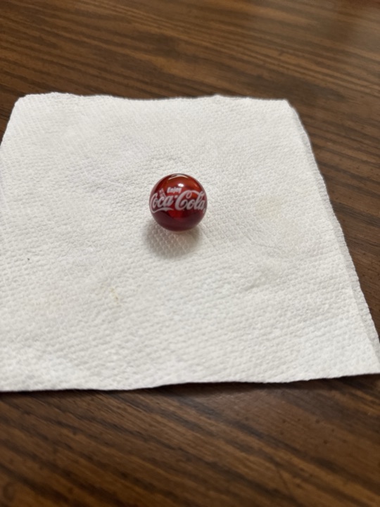 Enjoy Coca-Cola White Script on Red by Marble King, identification view