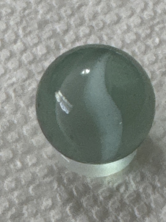 Gray Tint Clearie with White Ribbon by Vitro Agate, identification view