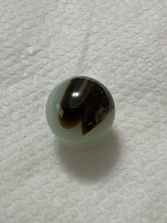 Brown on Mint Green Corkscrew by Akro Agate, identification view