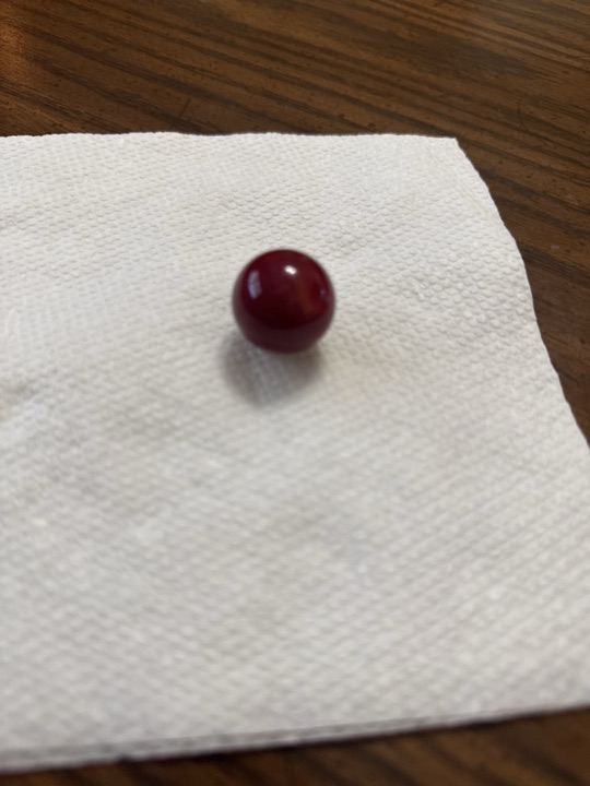 Opaque Red Shooter - Oxblood Game Marble by Vitro Agate, identification view