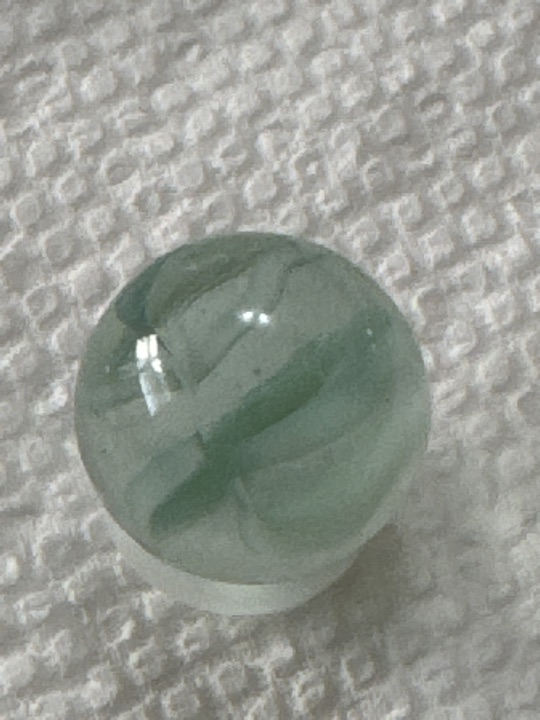 White Cat's Eye - Clear with White Vanes by Vitro Agate, identification view