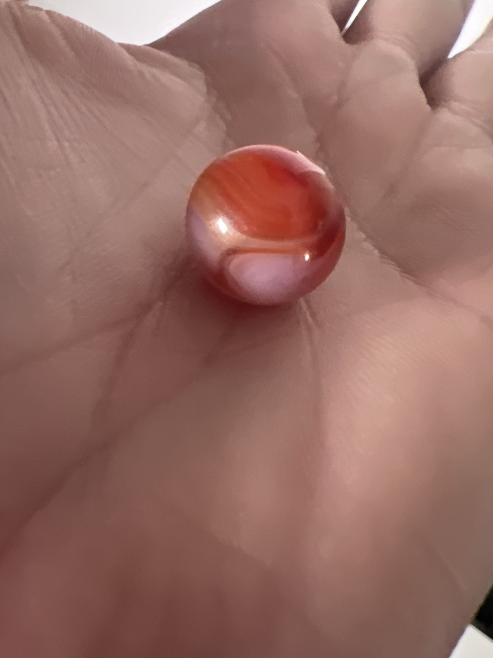 Red & White Swirl (with UV Streak) by Akro Agate Company